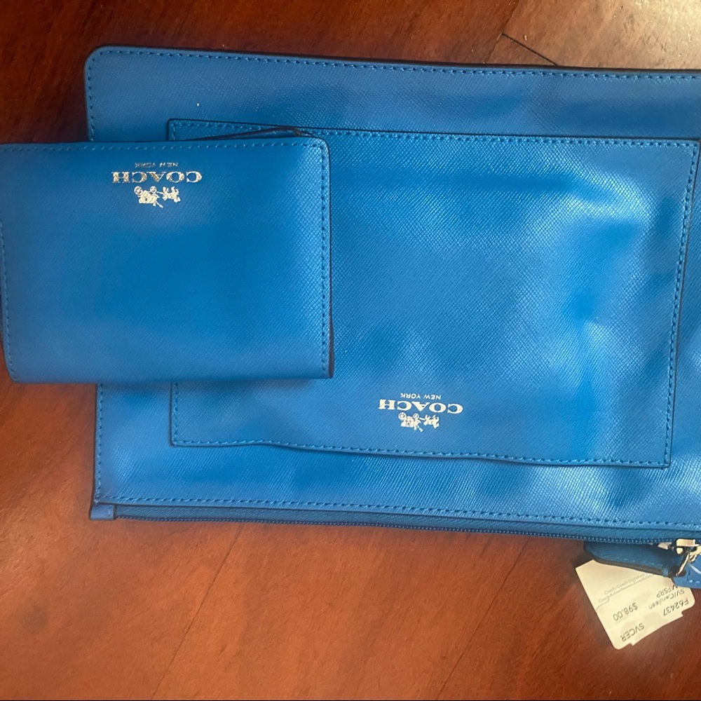 Two Coach pieces hand purse and wallet